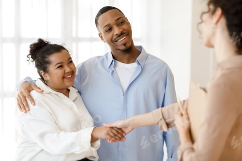 Preview: Happy black couple shaking family counselor hand, successful marital therapy