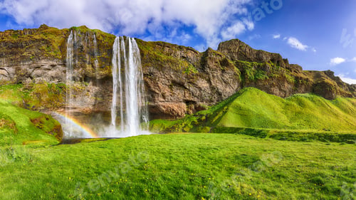 Preview: Fantastic Seljalandsfoss waterfall in Iceland during sunny day.