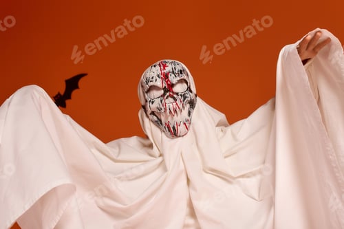 Preview: Cute girl in spooky costume celebrating Halloween with joy and excitement
