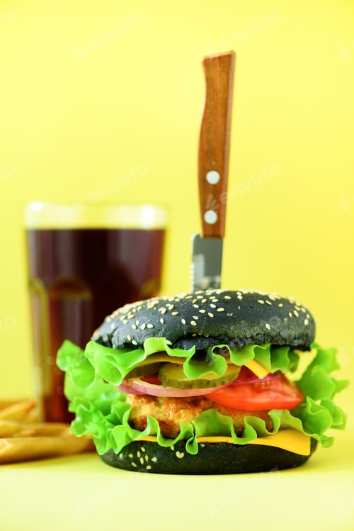 Preview: Fast food banner. Juicy meat burgers with cheese, lettuce on yellow background. Take away meal