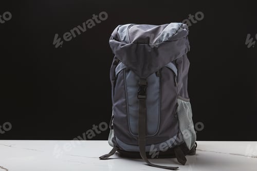 Preview: backpack for hiking on black background, travel concept