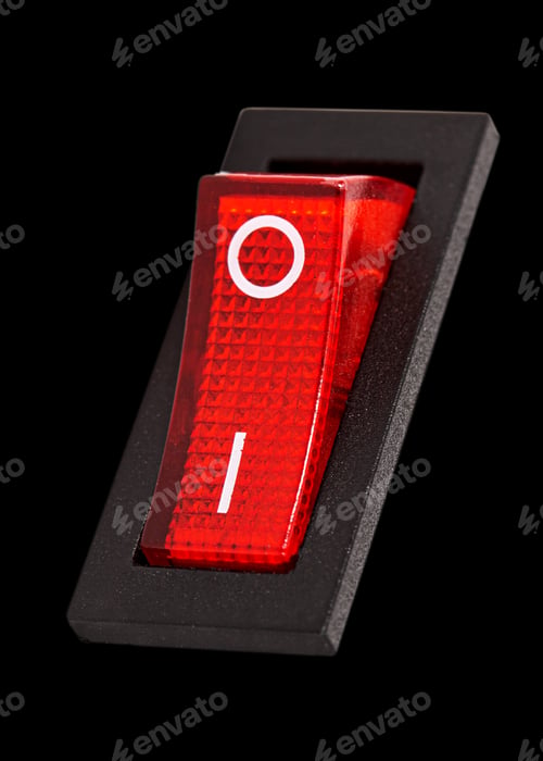 Preview: Red power switch at ON position, isolated on black background