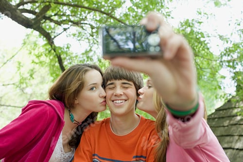 Preview: Teenagers posing for photographs