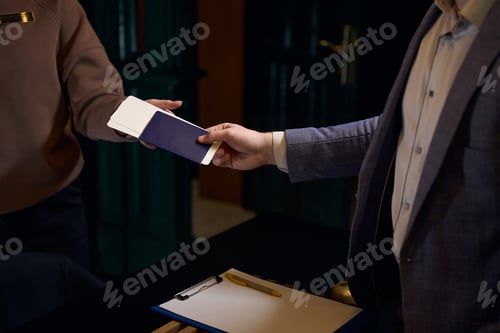 Preview: Woman administrator registers the guest at the hotel