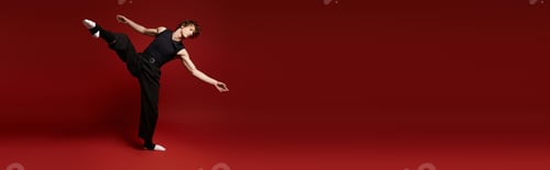 Preview: Energetic young dancer showcases his talent against a vibrant red backdrop