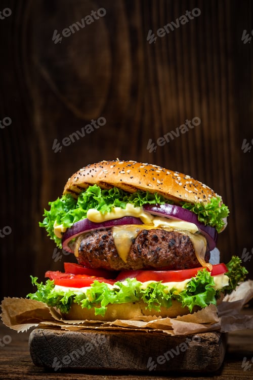Preview: Restaurant Burger with Salad and Sauce on Wooden Background