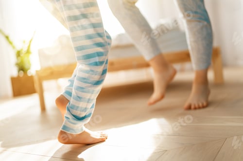 Preview: Mom and her daughter are dancing.