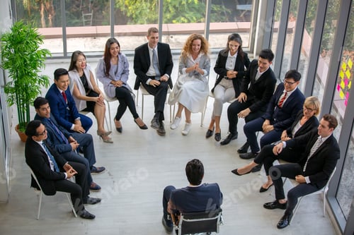 Preview: Diverse people in a seminar