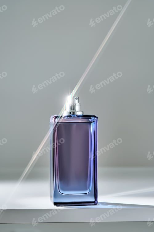 Preview: A blue bottle of perfume with a beautiful highlight.