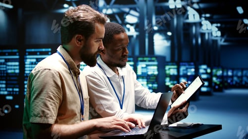 Preview: Coworkers running data center tests