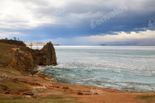 Preview: Cape Bogatyr on a cloudy spring day, Olkhon Island. Lake Baikal during the melting of the ice.