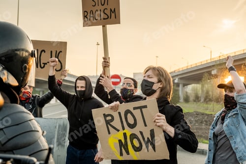 Preview: Group of protesters on road