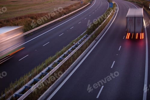 Preview: highway traffic - motion blurred truck on a highway/motorway/spe