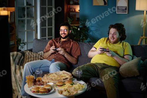Preview: Enjoying Video Games and Snacks in Cozy Living Room