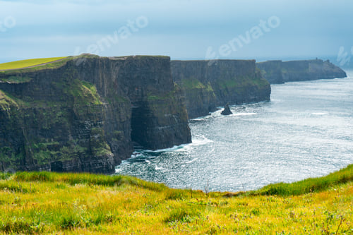 Preview: Scenic view of ocean waves crashing against the Cliffs of Moher in Ireland