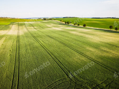 Preview: Aerial drone view of rolling hills and farmland