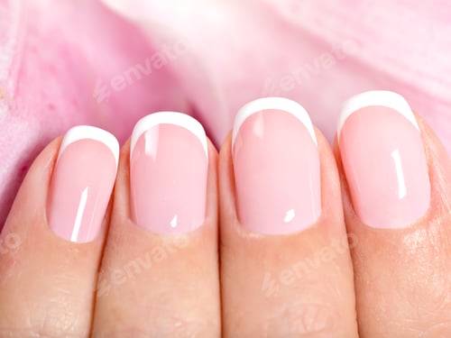 Preview: Beautiful woman's nails with french manicure