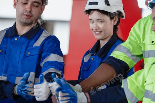 Preview: Successful cheerful and smiling engineer automation robot technician joining thumb up show hand