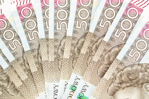 Preview: Plenty of Five Hundred Polish Zloty Banknotes on a Table