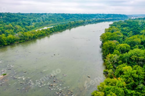 Preview: Aerial shot of a beautiful James River in Virginia, USA with a cloudy sky
