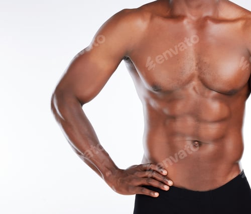 Preview: Cropped shot of an unrecognisable man standing alone in the studio and posing shirtless
