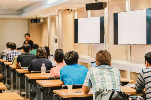 Preview: Conference Room with Attendees Listening to Speaker
