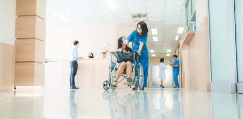 Preview: doctor assistant patient on wheelchair and give a treatment consultation, wearing face mask