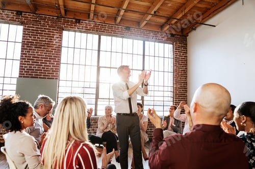Preview: People sitting and talking with a group