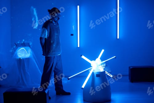 Preview: Experiencing Modern Art In Blue-Lit Exhibition Room