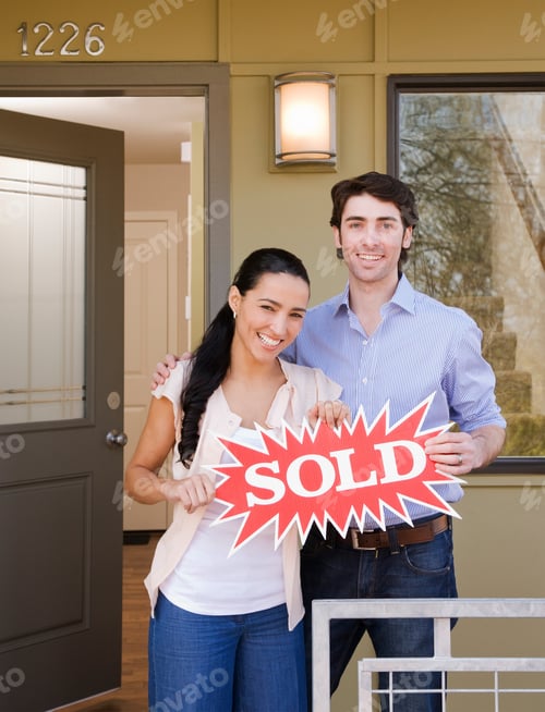 Preview: couple on front porch with sold sign