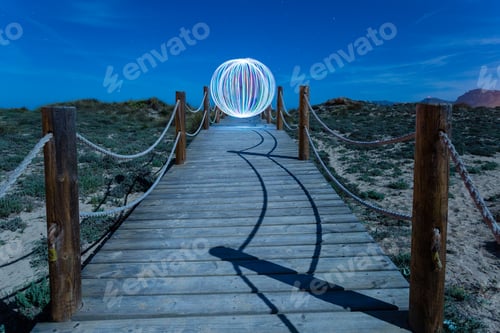 Preview: Abstract ball on footbridge between lands