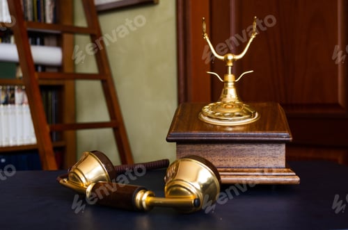 Preview: Closeup shot of a beautiful and vintage wooden telephone captured near the bookshelves