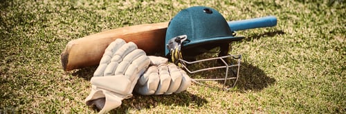 Preview: High angle view of cricket equipment on field