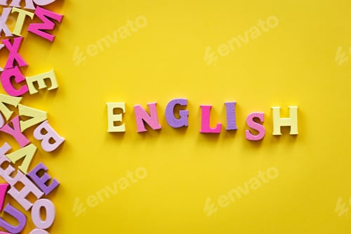 Preview: learn english language. text letters on yellow background.