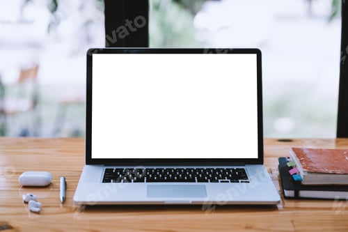 Preview: Laptop computer blank white screen on table at office . Mock up.
