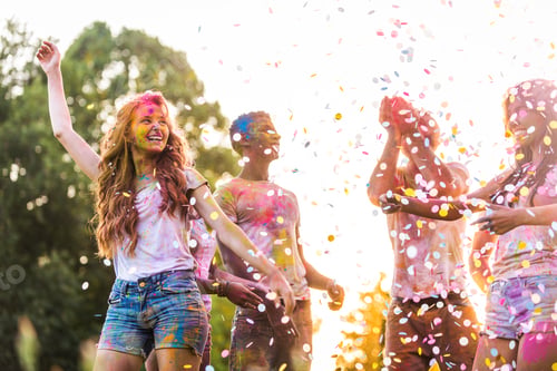 Preview: Friends playing with holi powder