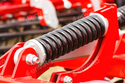 Preview: Steel spring on industrial or agricultural machinery, technology and engineering