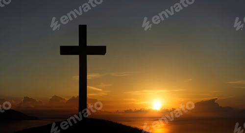 Preview: The cross standing on mountain sunset and flare background.