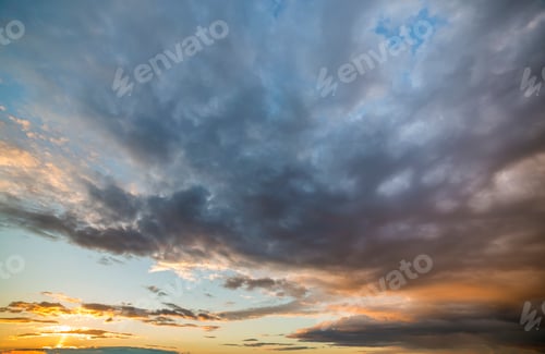 Preview: Panorama of sky at sunrise or sunset. Beautiful view of dark blue clouds
