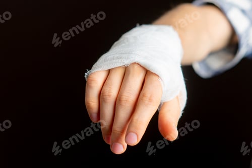 Preview: applying bandage on hand. injure treat b