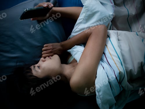 Preview: Woman sleep and holding mobile