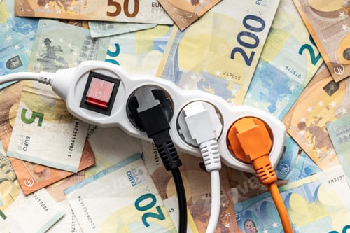 Preview: Electric plugs, socket and euro money. Concept of increasing electric prices. Top view.
