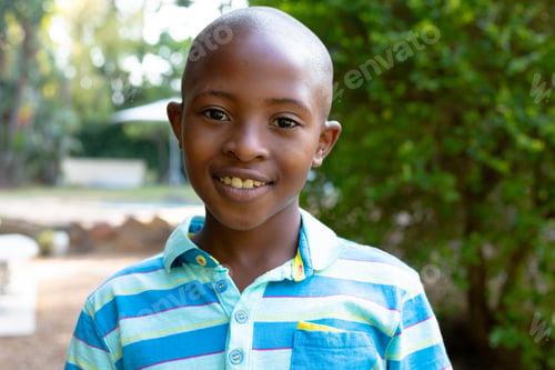 Preview: Portrait of an African American boy spending time in the garden