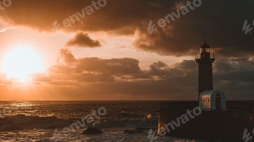 Preview: Farolim de Felgueiras against the vivid sunset sky