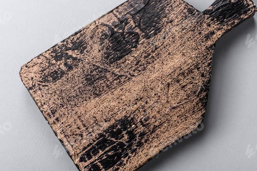Preview: Empty wooden cutting board on gray textured concrete background