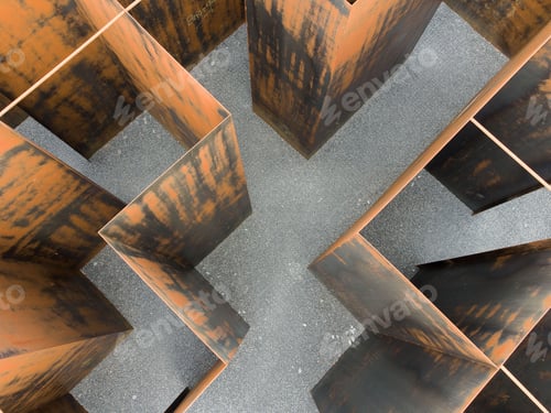 Preview: Series of brown and black metal structures on the gray background