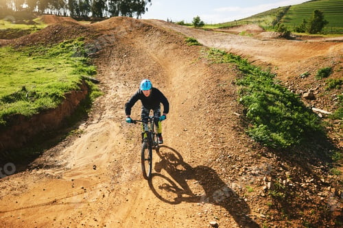 Preview: Cycling, sports and man in nature on bicycle for adrenaline on adventure, freedom and speed. Mounta