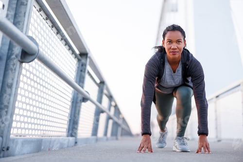 Preview: Woman warming up before morning jogging