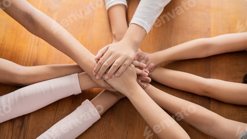 Preview: Multicultural stack of children hands together