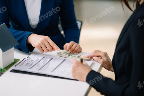 Preview: Real estate broker agent presenting and consult to customer to decision making sign insurance form a